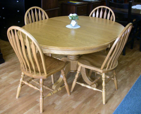 Mennonite single pedestal oak table, handcrafted solid oak table with Cambridge side chairs, Lloyd's Mennonite Furniture Bradford Ontario.